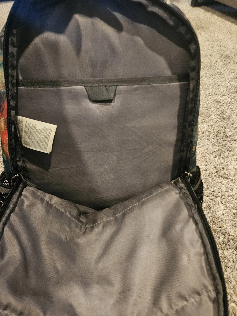 The North Face Multicolor Tie-Dye Backpack with Black Accents and Mustard Panel